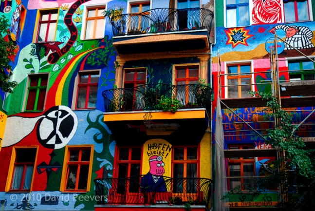 Brilliantly painted house with the ornate balconies.