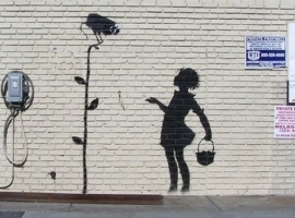 Banksy Los Angeles mural Flower Girl.