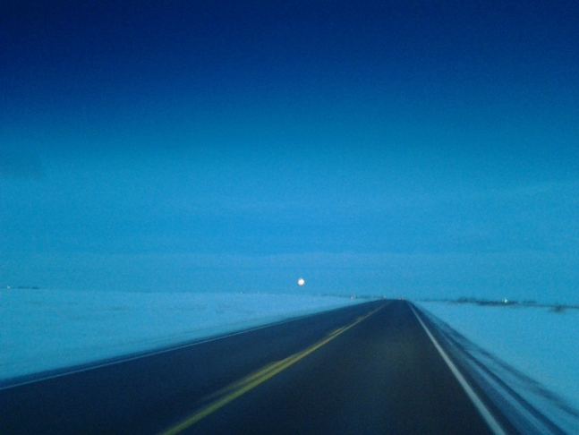  the massive full moon looks on film like only a dot