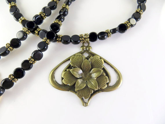 Black and gold beaded necklace.